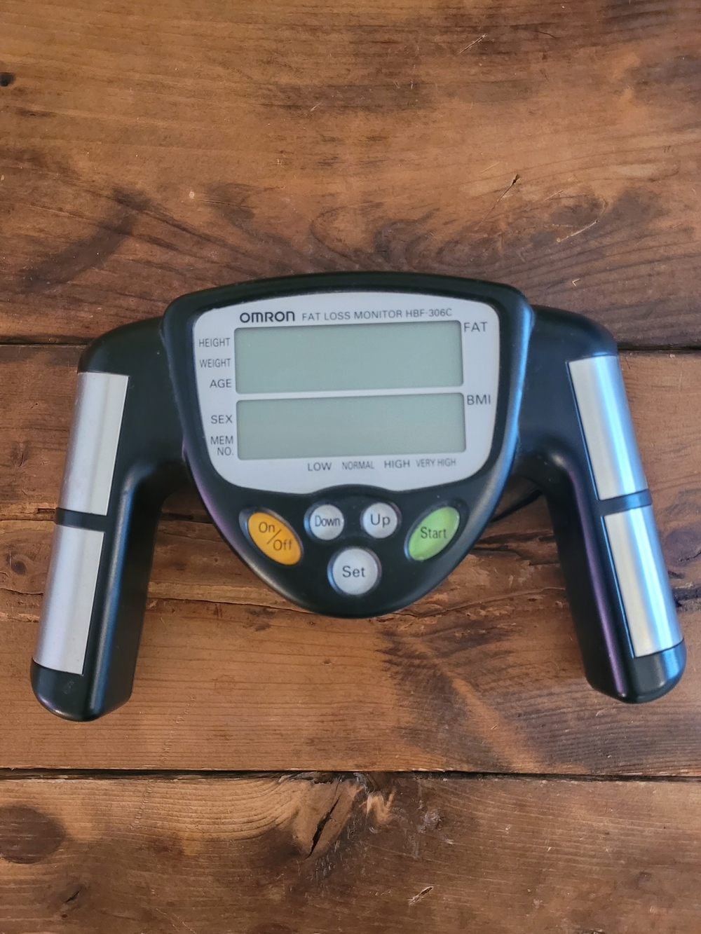 OMRON Fat Loss Monitor HBF-306C in Black with Yellow and Green Buttons